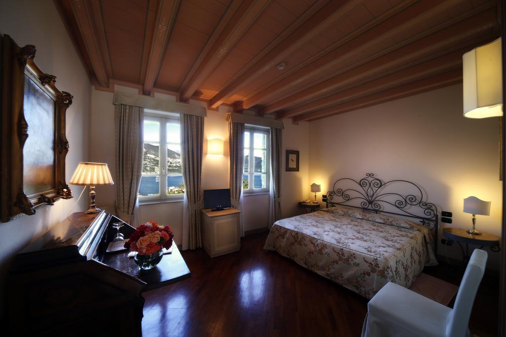 Romantik Hotel Relais Mirabella Iseo Camera foto